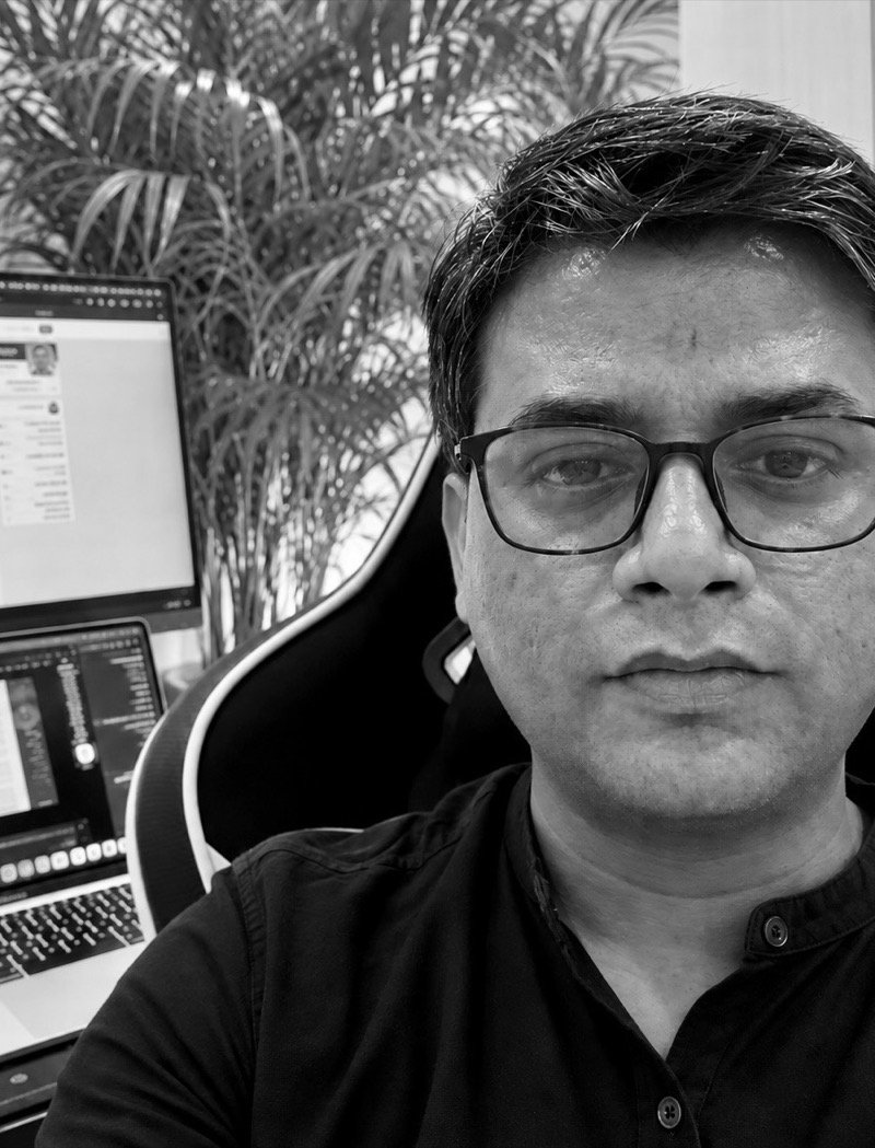 Devashish Pawar at his desk